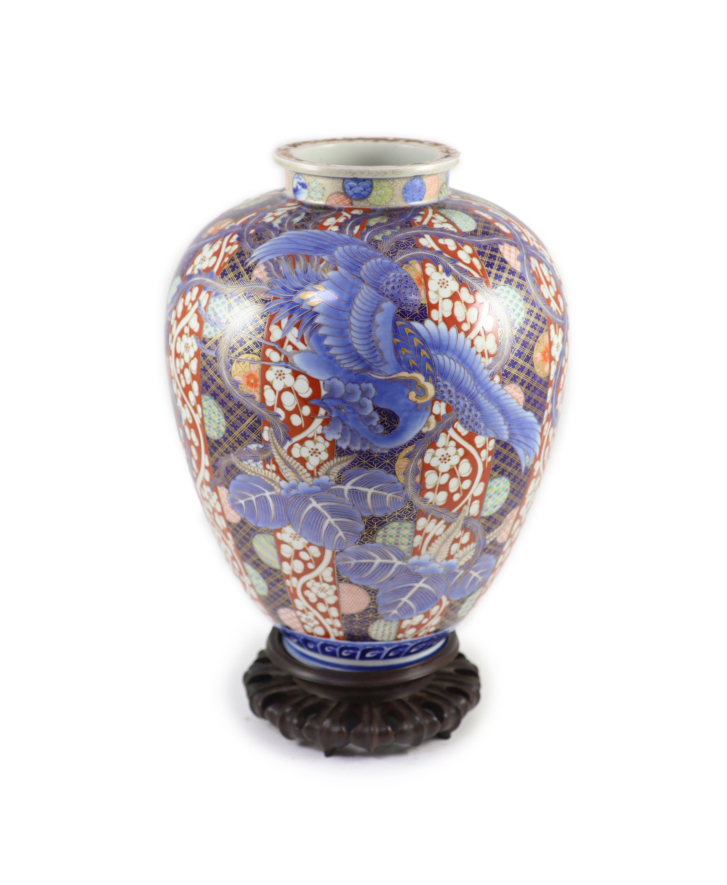 A large Japanese Imari ovoid vase, Meiji period, by Fukagawa, 37.5 cm high, wood stand